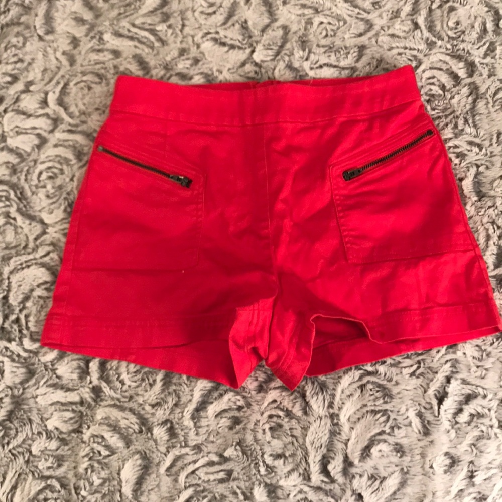 Orange high waisted shorts